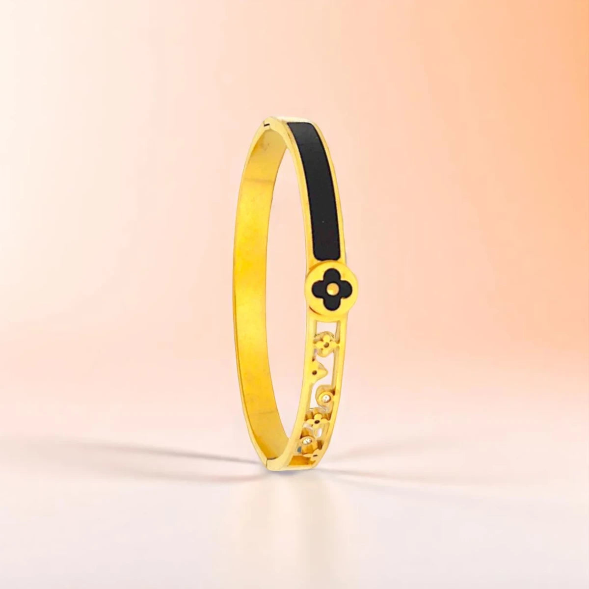 Bracelet set against a soft gradient background.