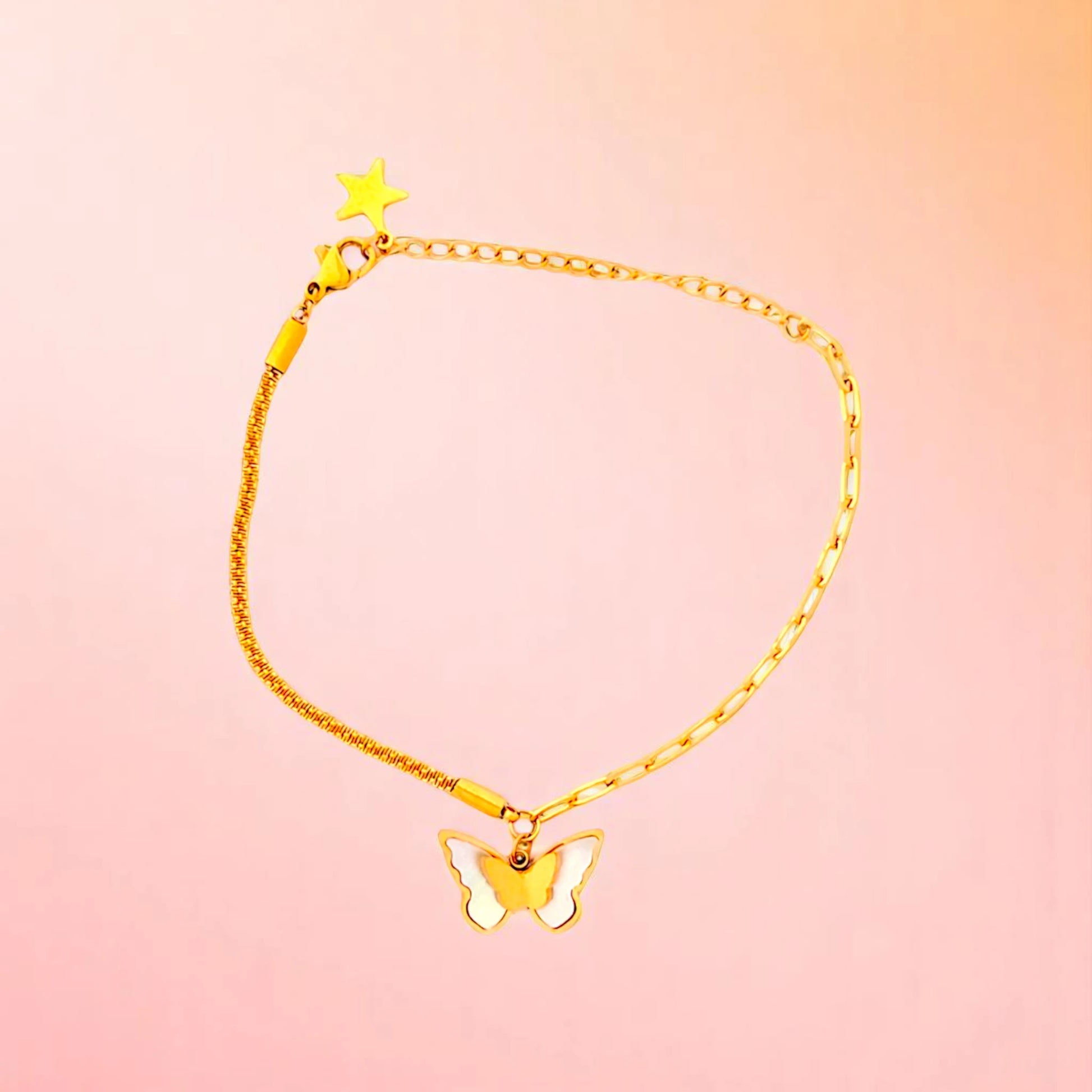 Bracelet on a color gradient of peach tones background.