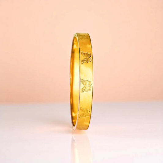 Bracelet set against a soft gradient background.