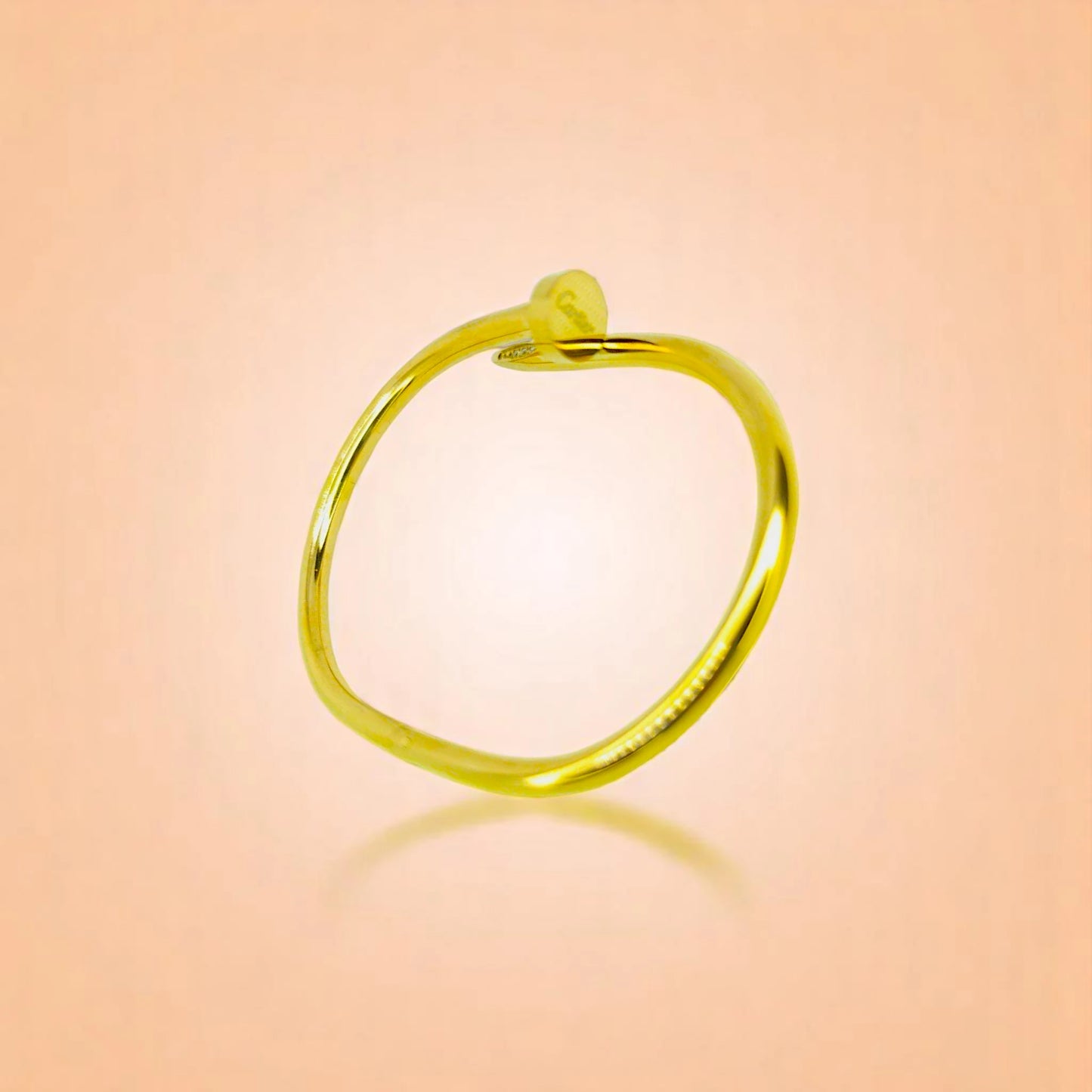 Bracelet on a color gradient of peach tones background