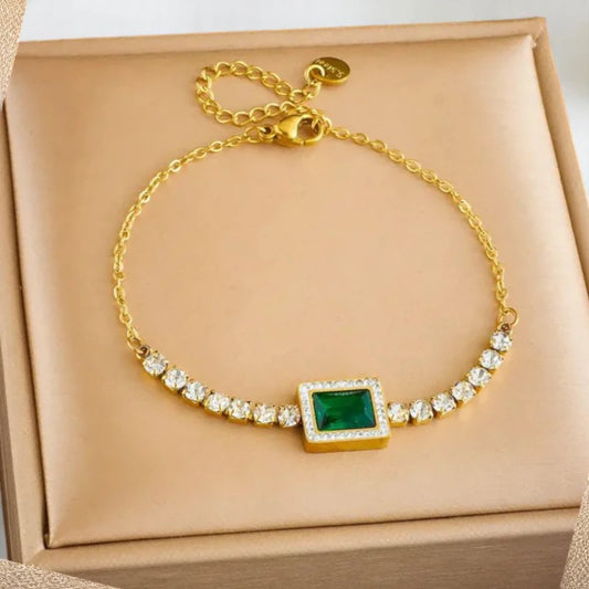 Bracelet on soft fabric box with a light toned background.