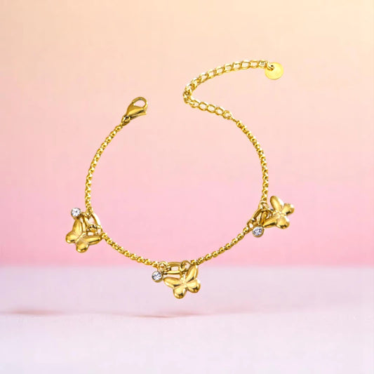 Bracelet on a color gradient of peach tones background.