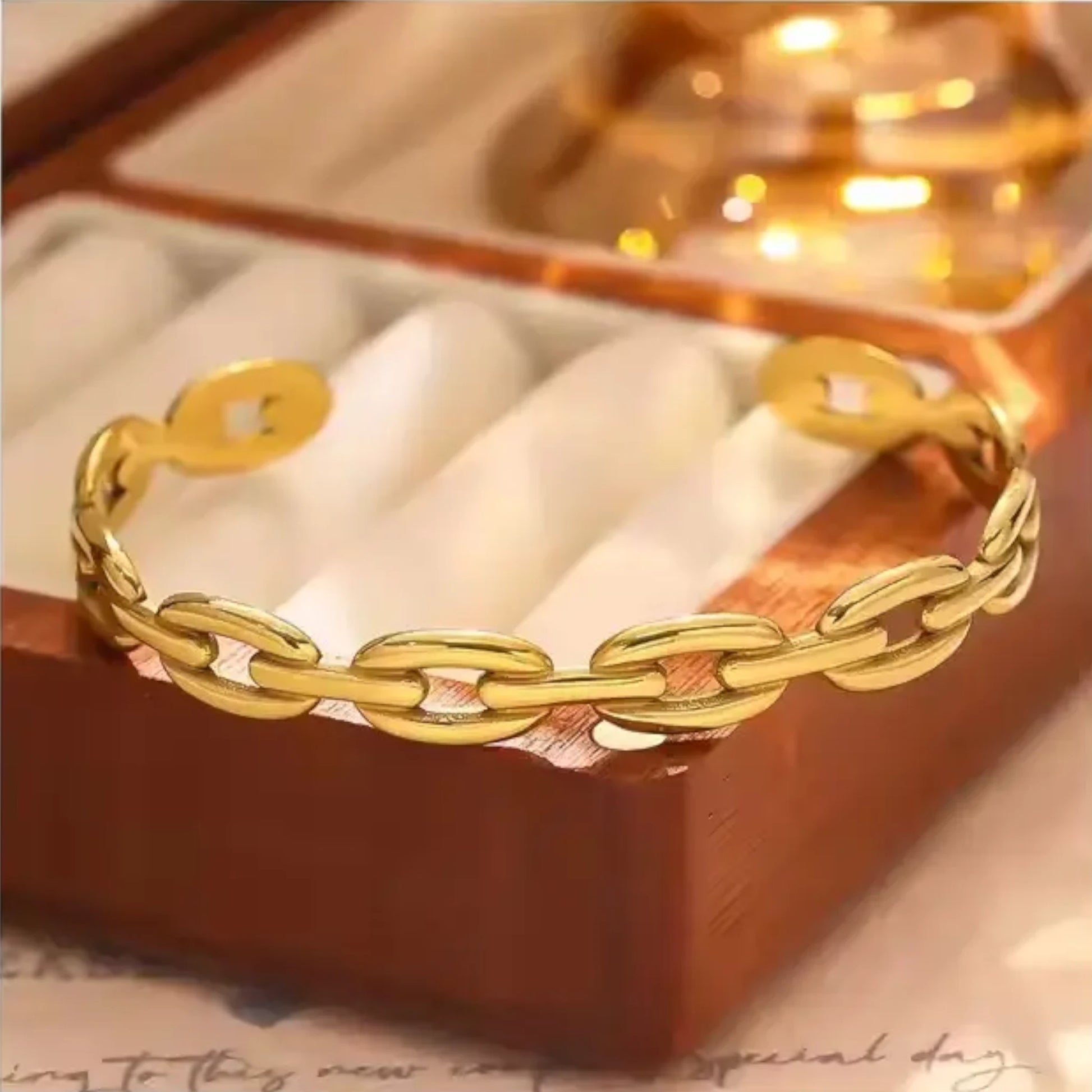 Bracelet on soft fabric wooden box with a toned background.