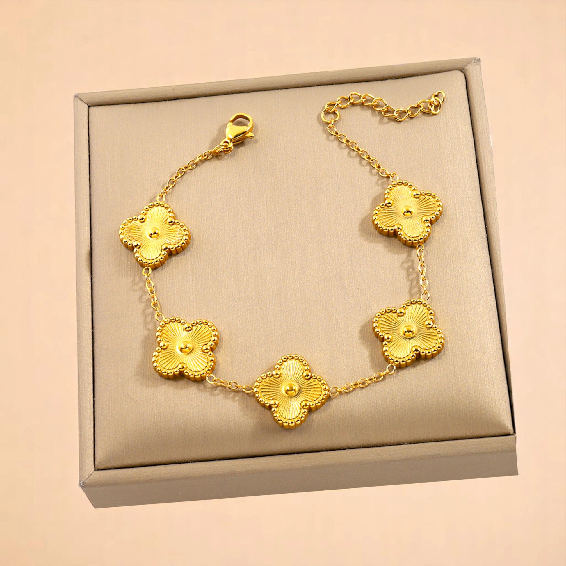 Bracelet on soft fabric box with a light toned background.