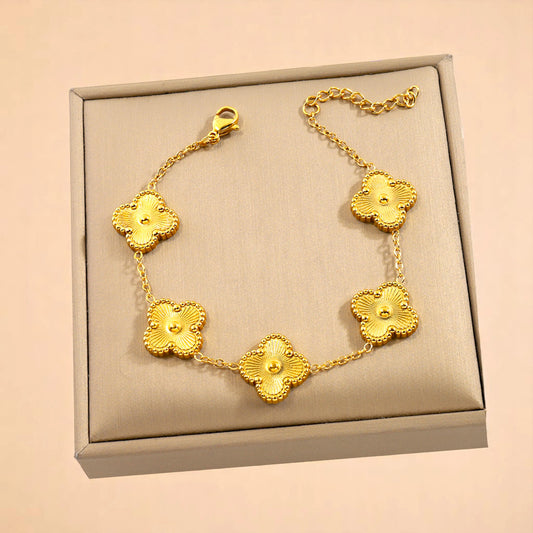 Bracelet on soft fabric box with a light toned background.