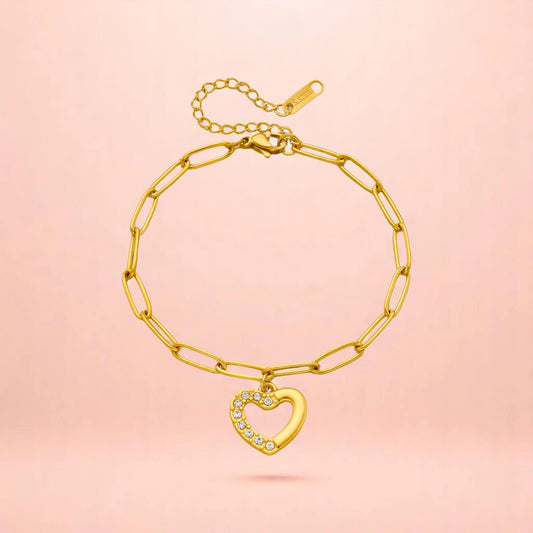 Bracelet on a color gradient of peach tones background.