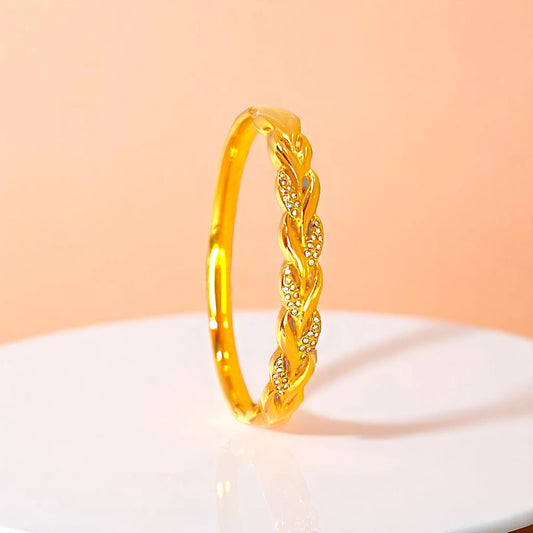 Bracelet set against a soft gradient background.