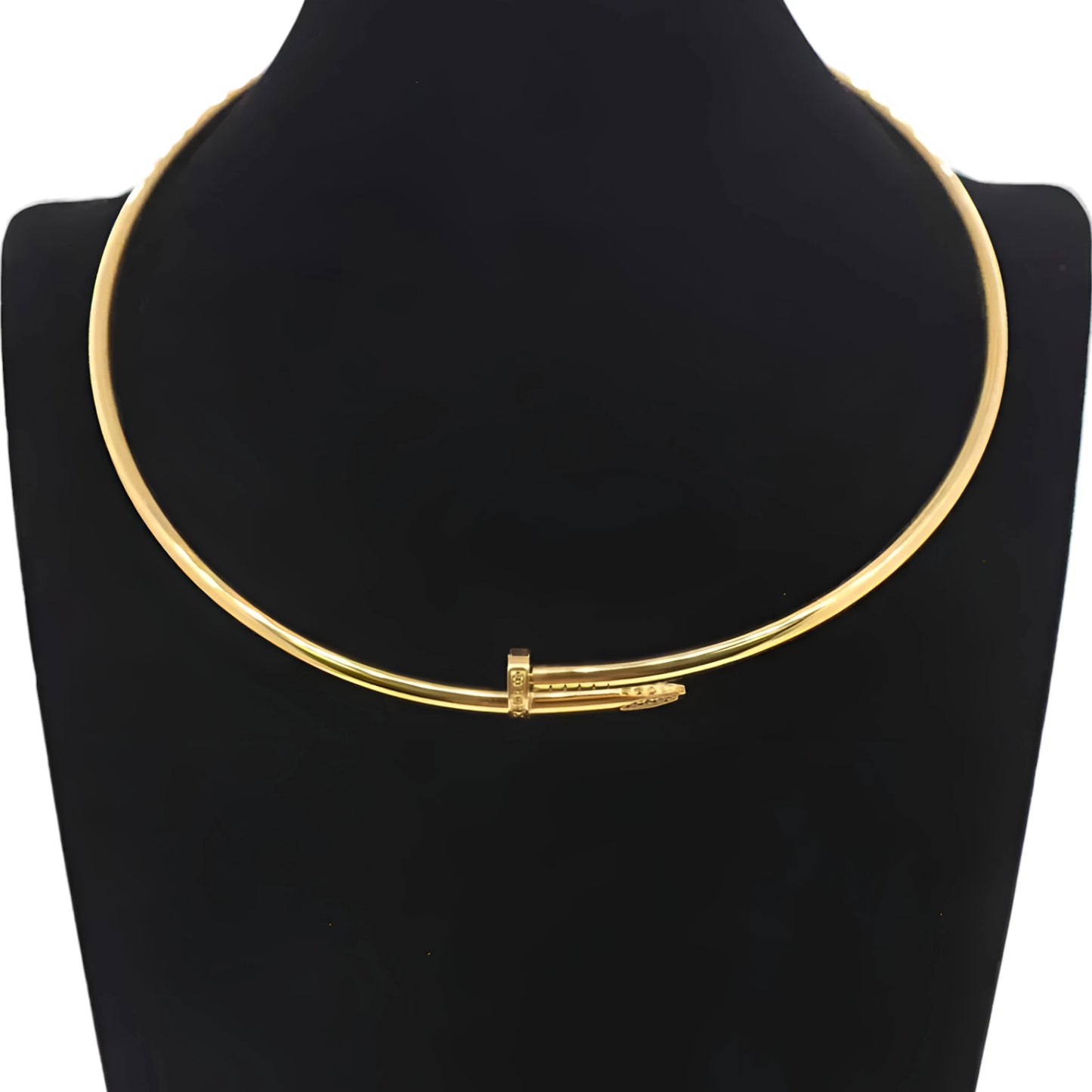 An elegant gold nail choker necklace with a minimalist design is displayed on a black mannequin, highlighting modern and bold fashion aesthetics.