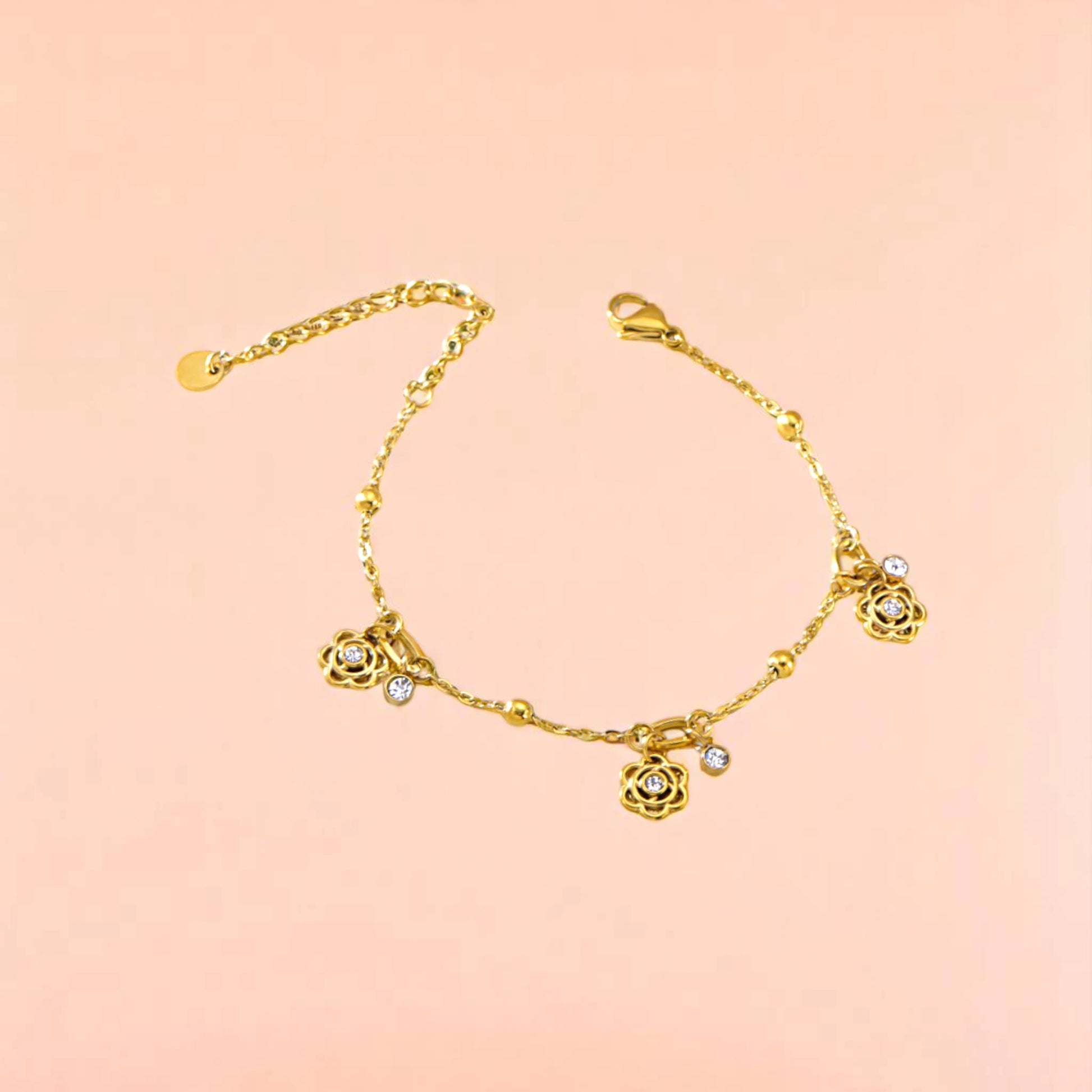 Bracelet on a color gradient of peach tones background.