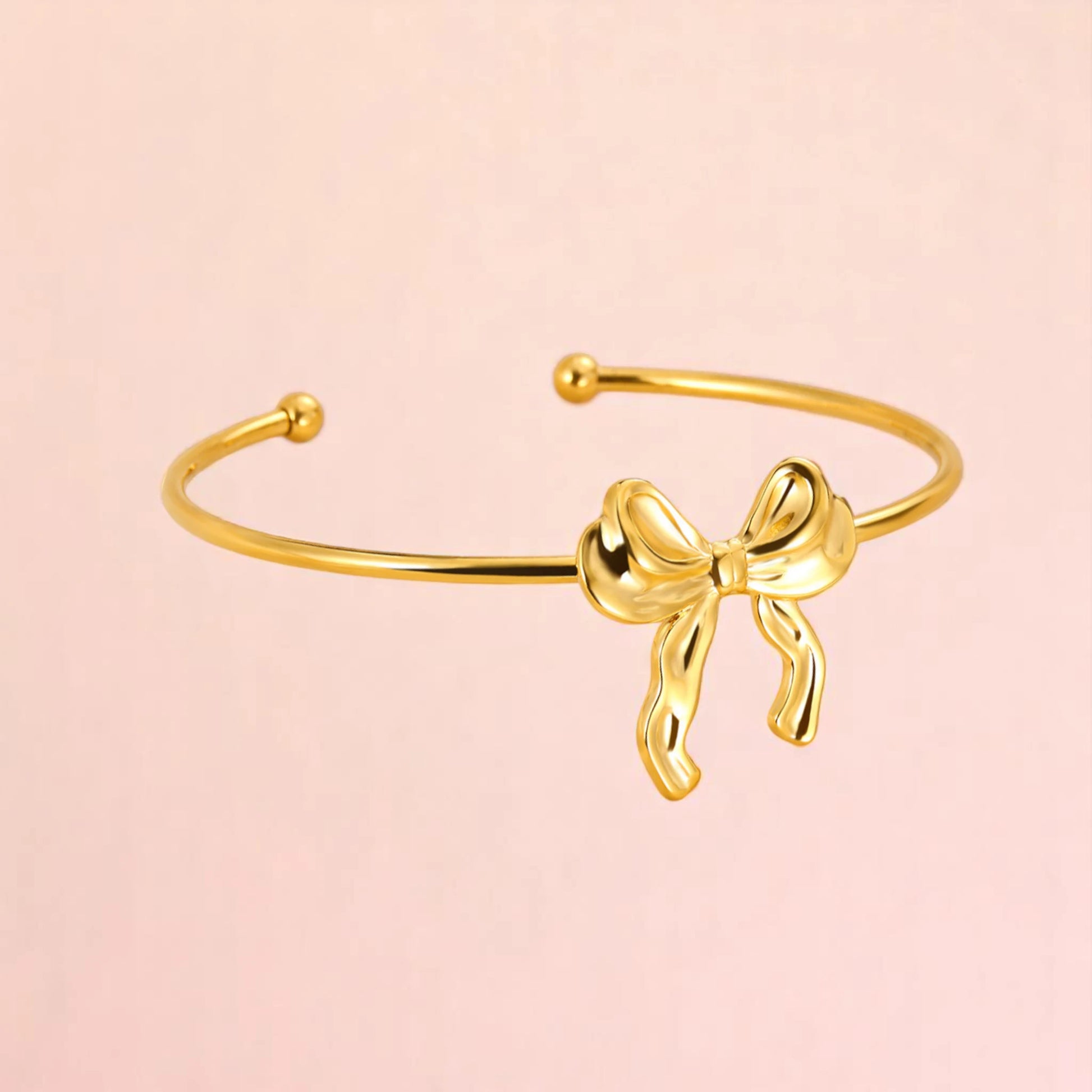 Bracelet on a color gradient of peach tones background.