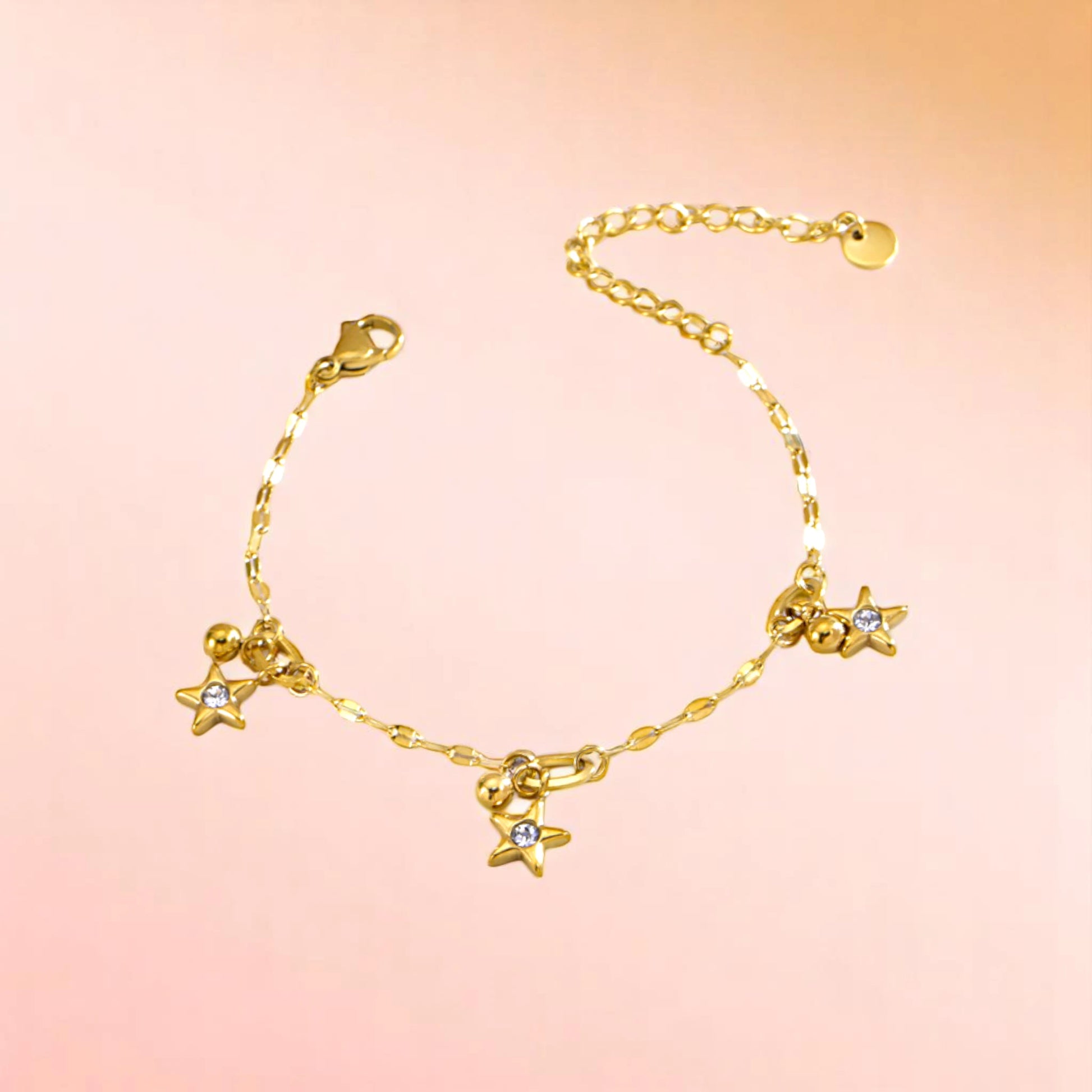 Bracelet on a color gradient of peach tones background.