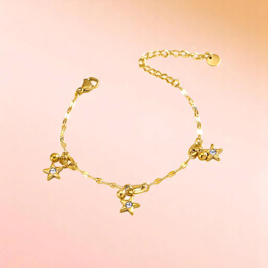 Bracelet on a color gradient of peach tones background.