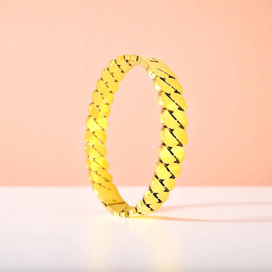 Bracelet set against a soft gradient background.