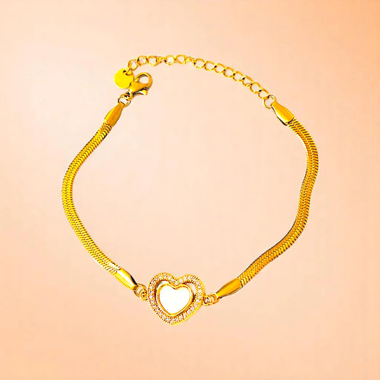 Bracelet on a color gradient of peach tones background.