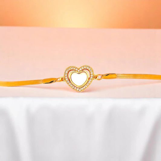 Bracelet on white nylon cloth with a peach-colored gradient in the background.