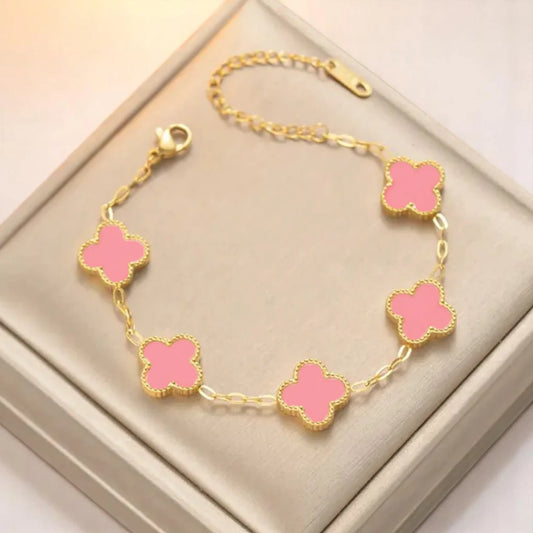 Bracelet on a soft fabric box with a light-toned background.