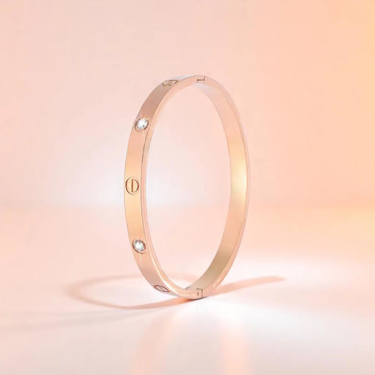 Bracelet set against a soft gradient background.