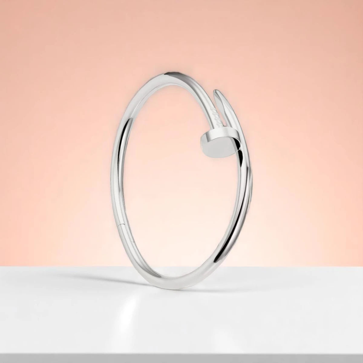 Bracelet set against a soft gradient background.