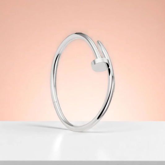 Bracelet set against a soft gradient background.