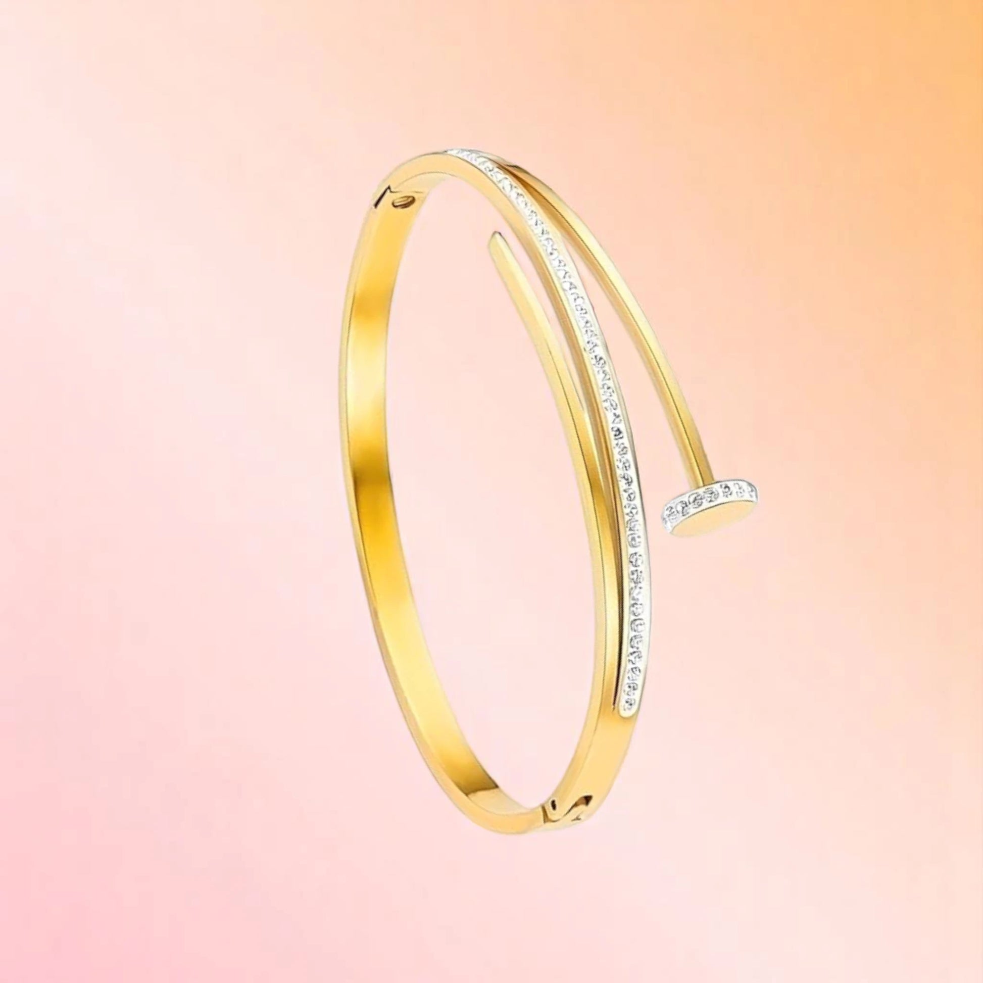 Bracelet on a color gradient of peach tones background.