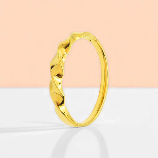 Bracelet set against a soft gradient background.