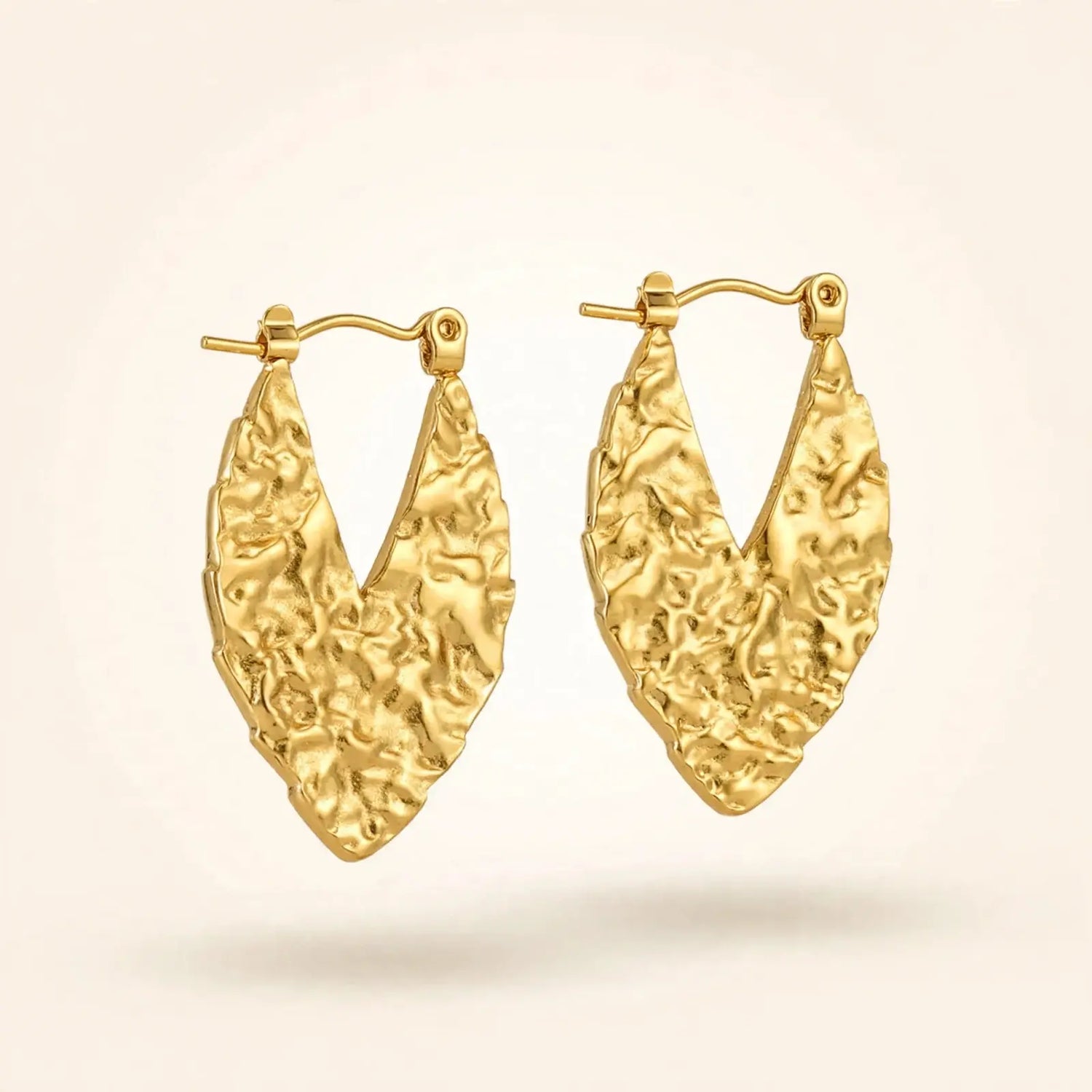 Frost Flow | Wave-Patterned Gold Hoop Earrings