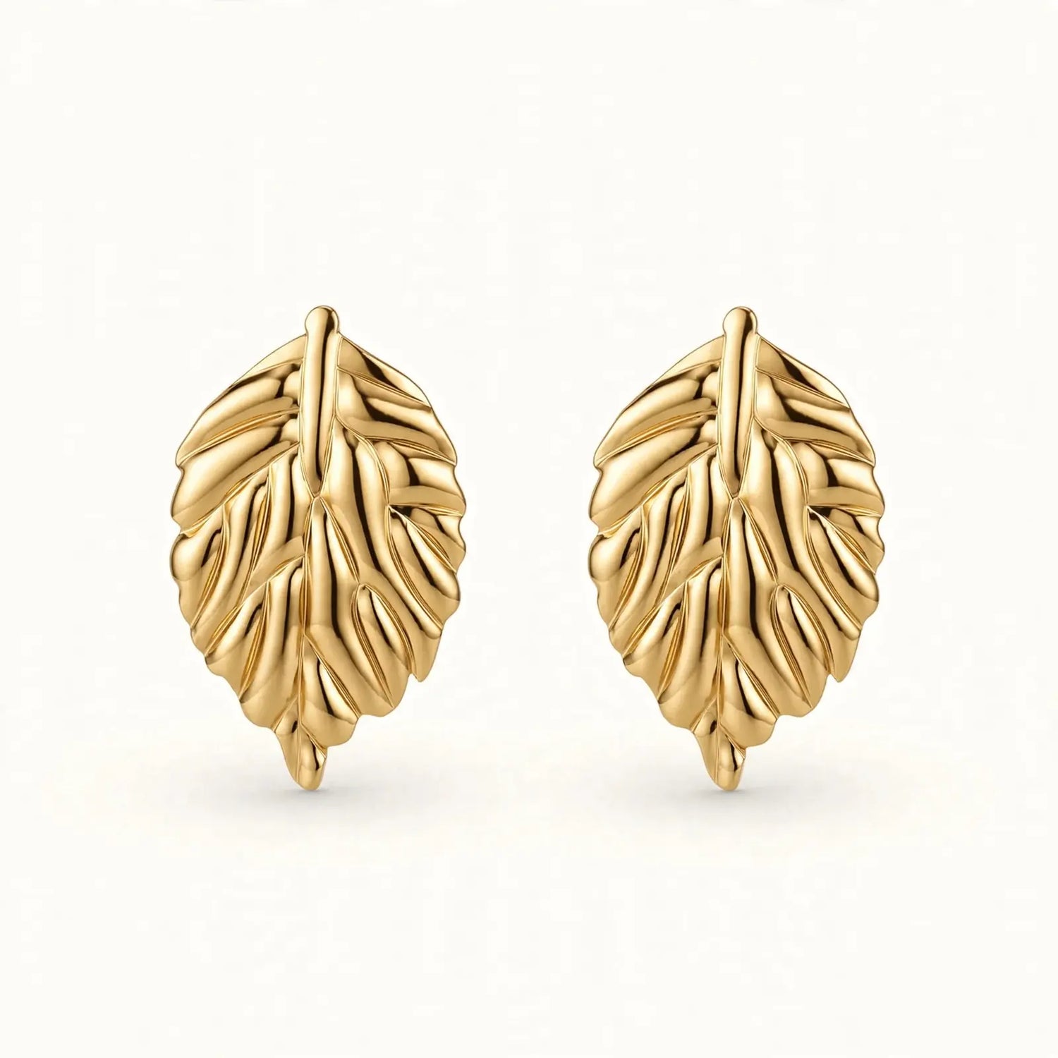 Golden Poise | Leaf Motif Stud Earrings
