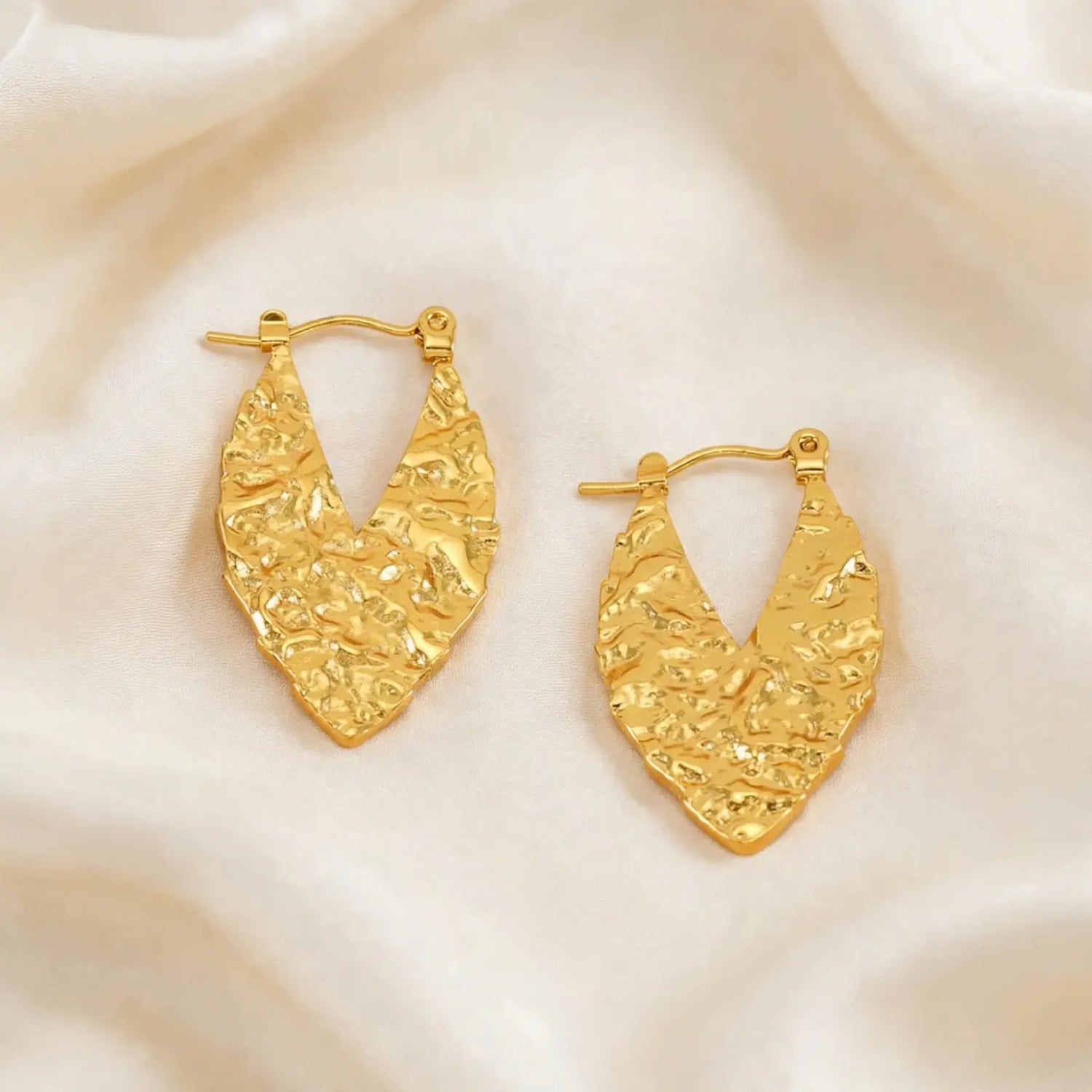 Frost Flow | Wave-Patterned Gold Hoop Earrings