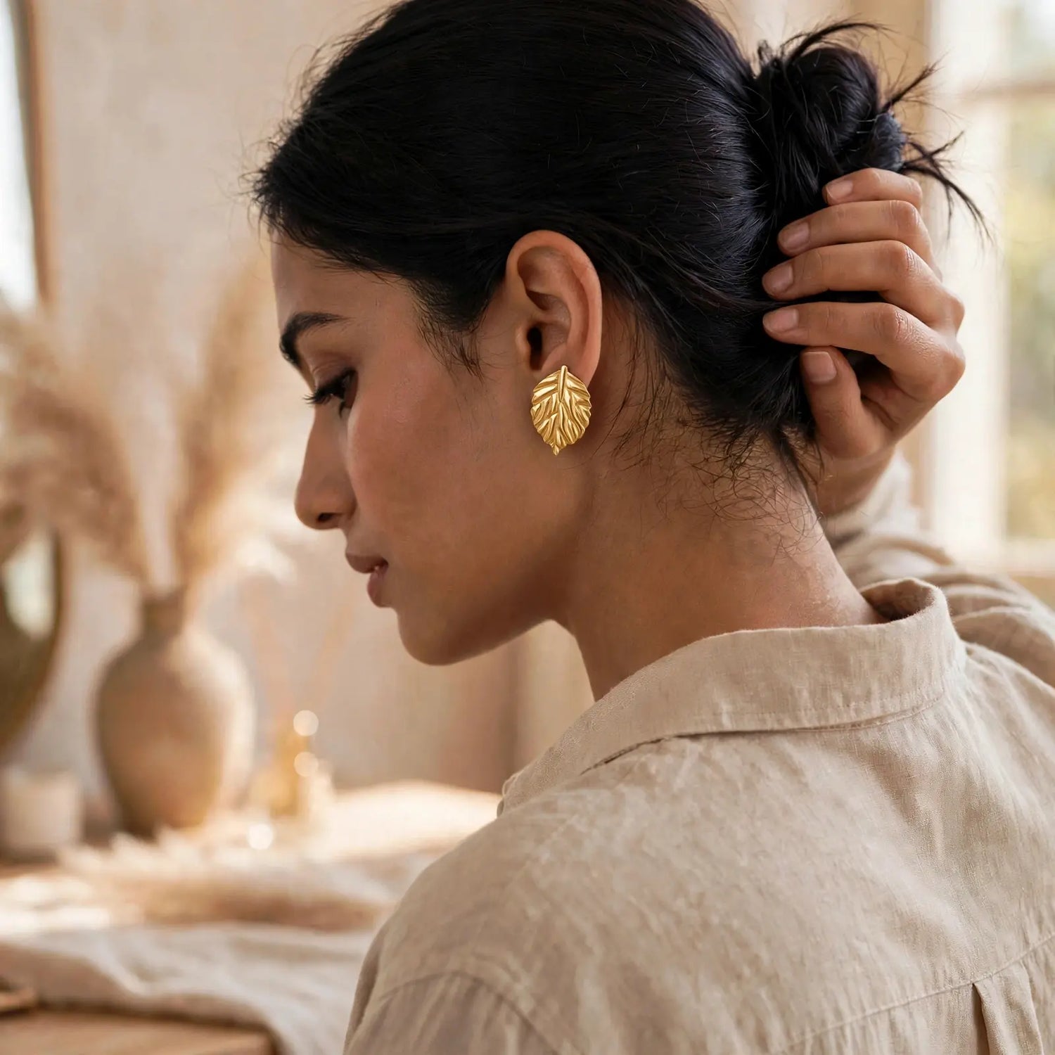 Golden Poise | Leaf Motif Stud Earrings