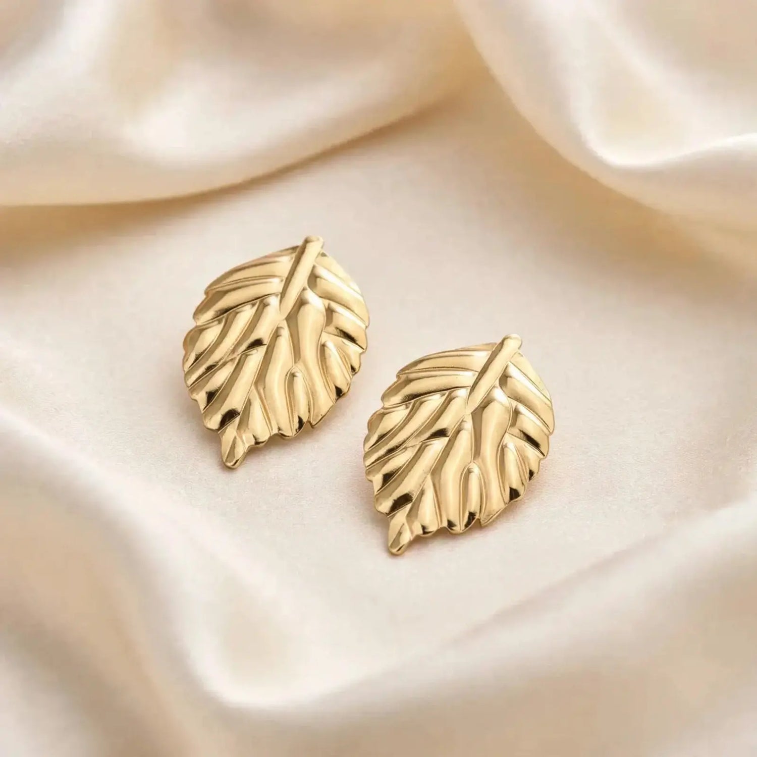 Golden Poise | Leaf Motif Stud Earrings