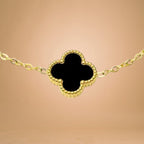 Bracelet zoom-in shot displayed on a peach-toned background.