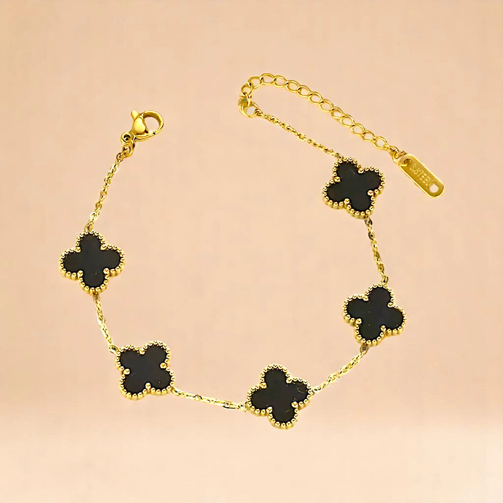 Bracelet on a color gradient of peach tones background.