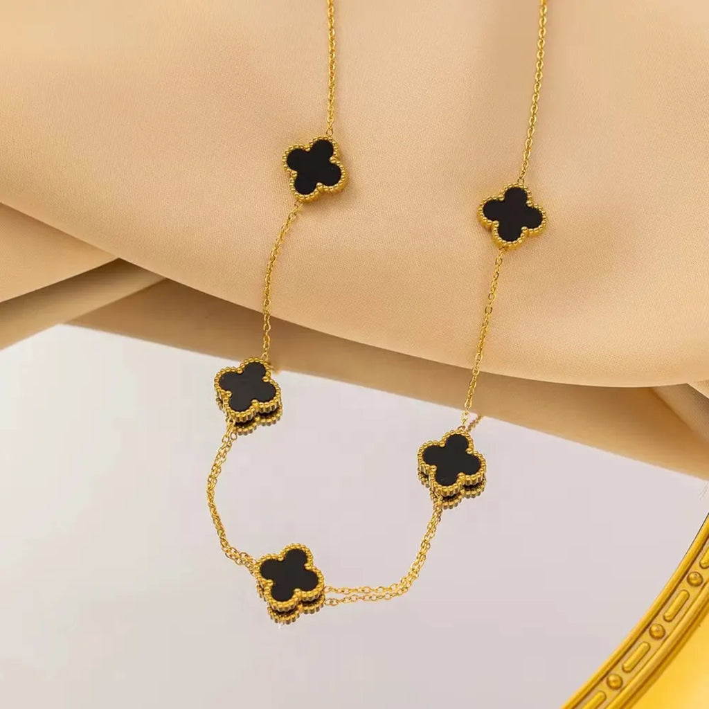 Bracelet on a mirror and on a beige-color cloth
