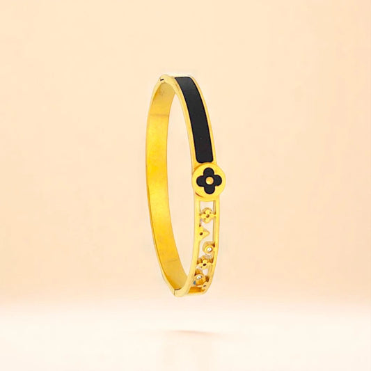 Bracelet on a color gradient of light tones background.