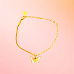 Bracelet on a color gradient of peach tones background.
