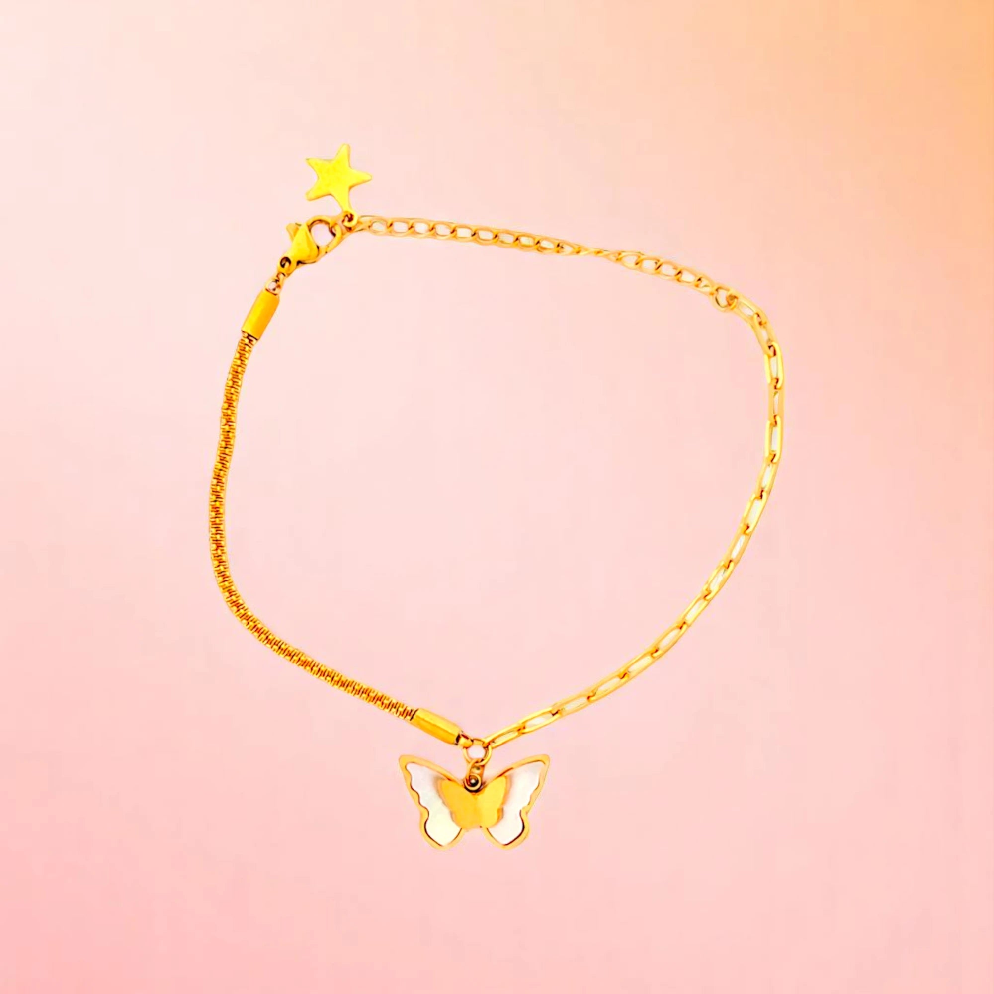 Bracelet on a color gradient of peach tones background.