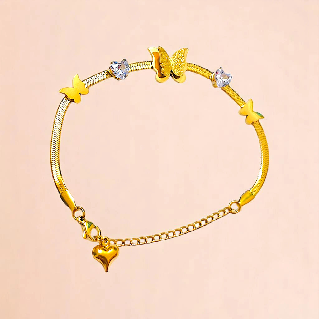 Bracelet on a color gradient of peach tones background.