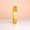 Bracelet set against a soft gradient background.