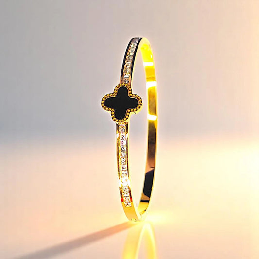 Bracelet on a color gradient of peach tones background.