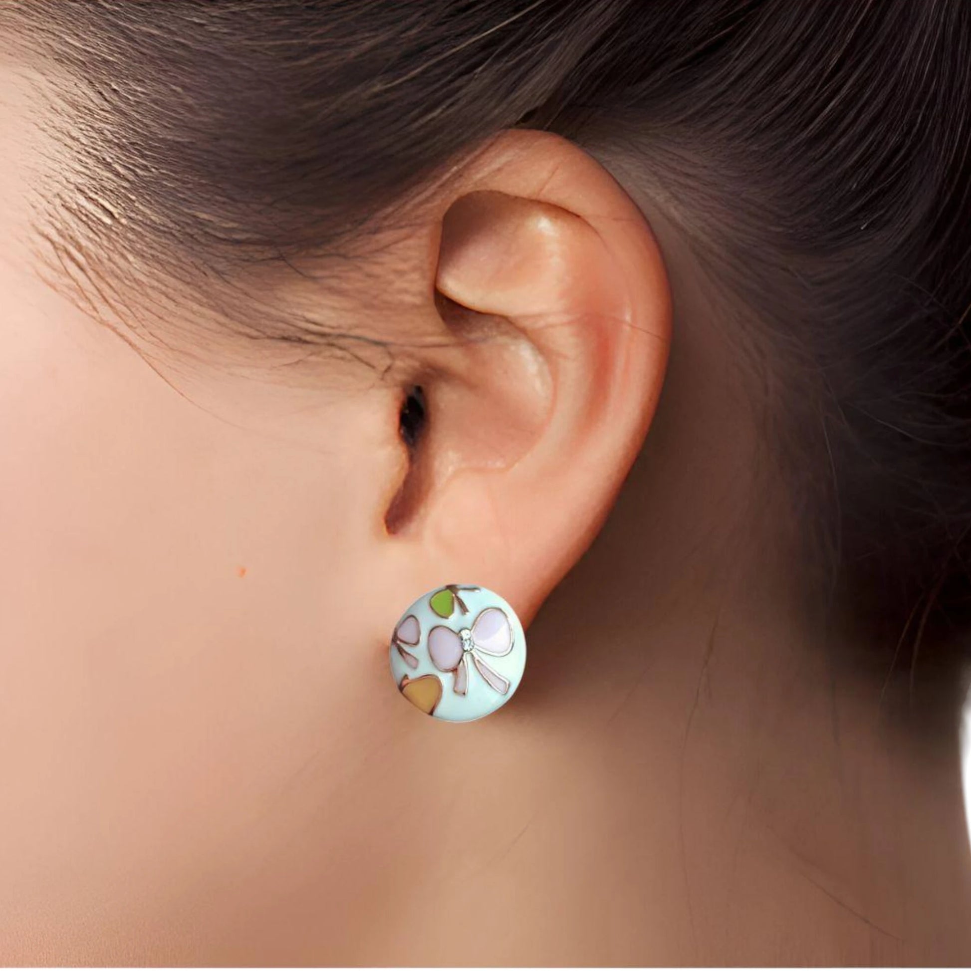Floral Pink Butterfly White Studs worn by a model.