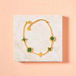 Bracelet on geometric prop with peach color gradient in the background.