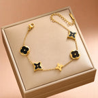 Bracelet on soft fabric box with a light toned background.