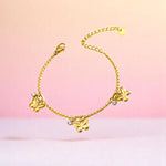 Bracelet on a color gradient of peach tones background.