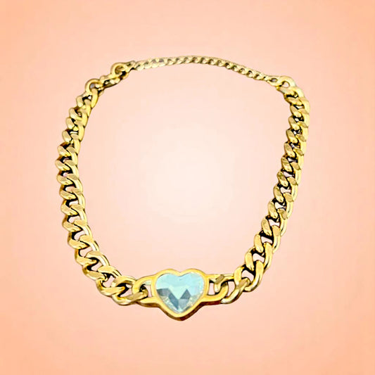 Bracelet on a color gradient of peach tones background.