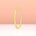 Bracelet set against a soft gradient background.