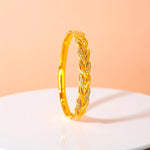 Bracelet set against a soft gradient background.