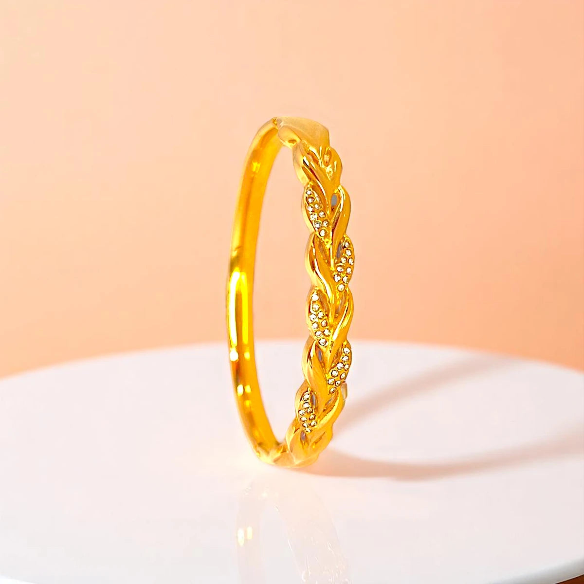 Bracelet set against a soft gradient background.