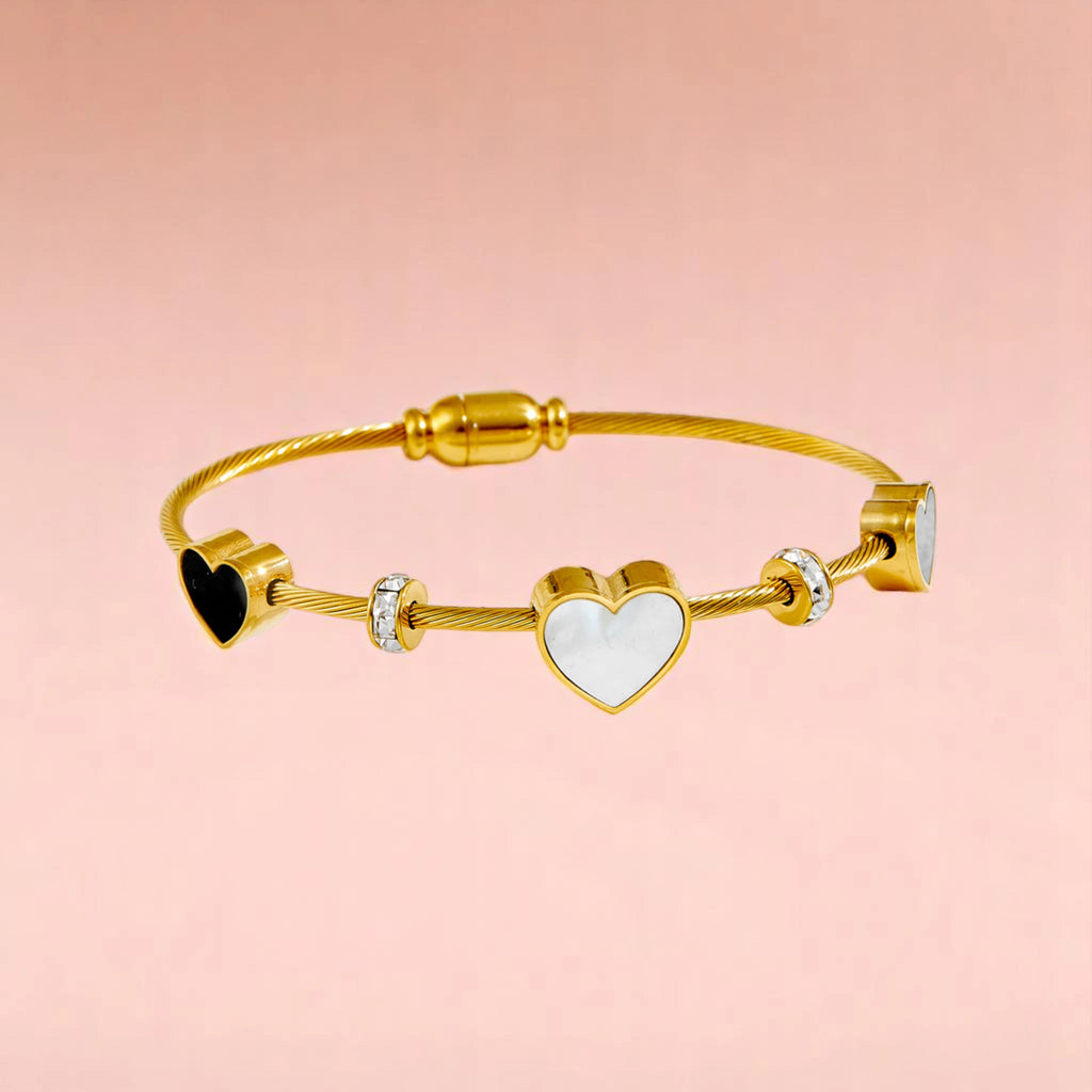 Bracelet on a color gradient of peach tones background.