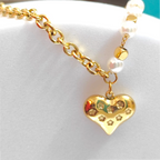 Bracelet zoom-in shot displayed on a light-toned background.