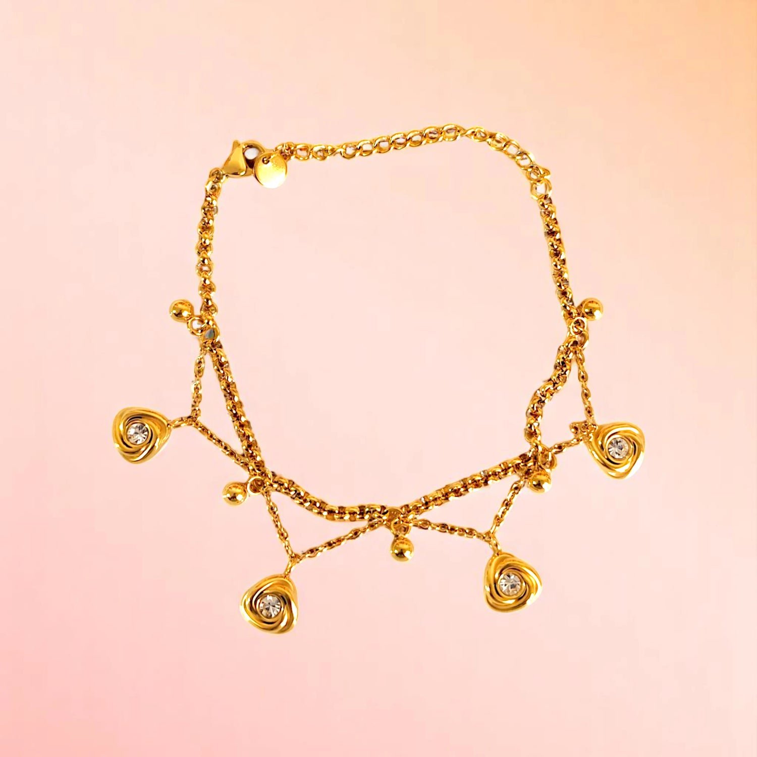 Bracelet on a color gradient of peach tones background.